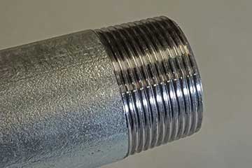 Close-up of precision threaded pipe